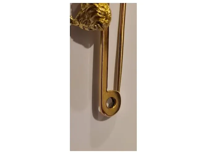 Autre Marque Broche barra perro pequinés dorado Gold hardware 
