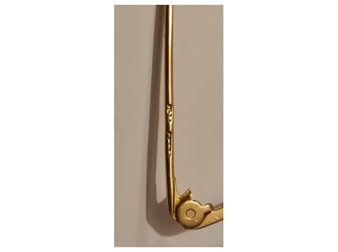 Autre Marque Broche barra perro pequinés dorado Gold hardware 
