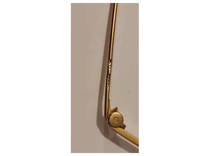 Autre Marque Broche barra perro pequinés dorado Gold hardware 