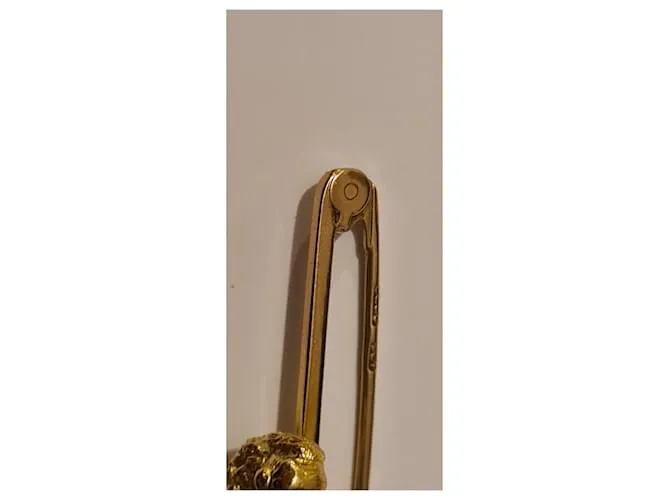 Autre Marque Broche barra perro pequinés dorado Gold hardware 