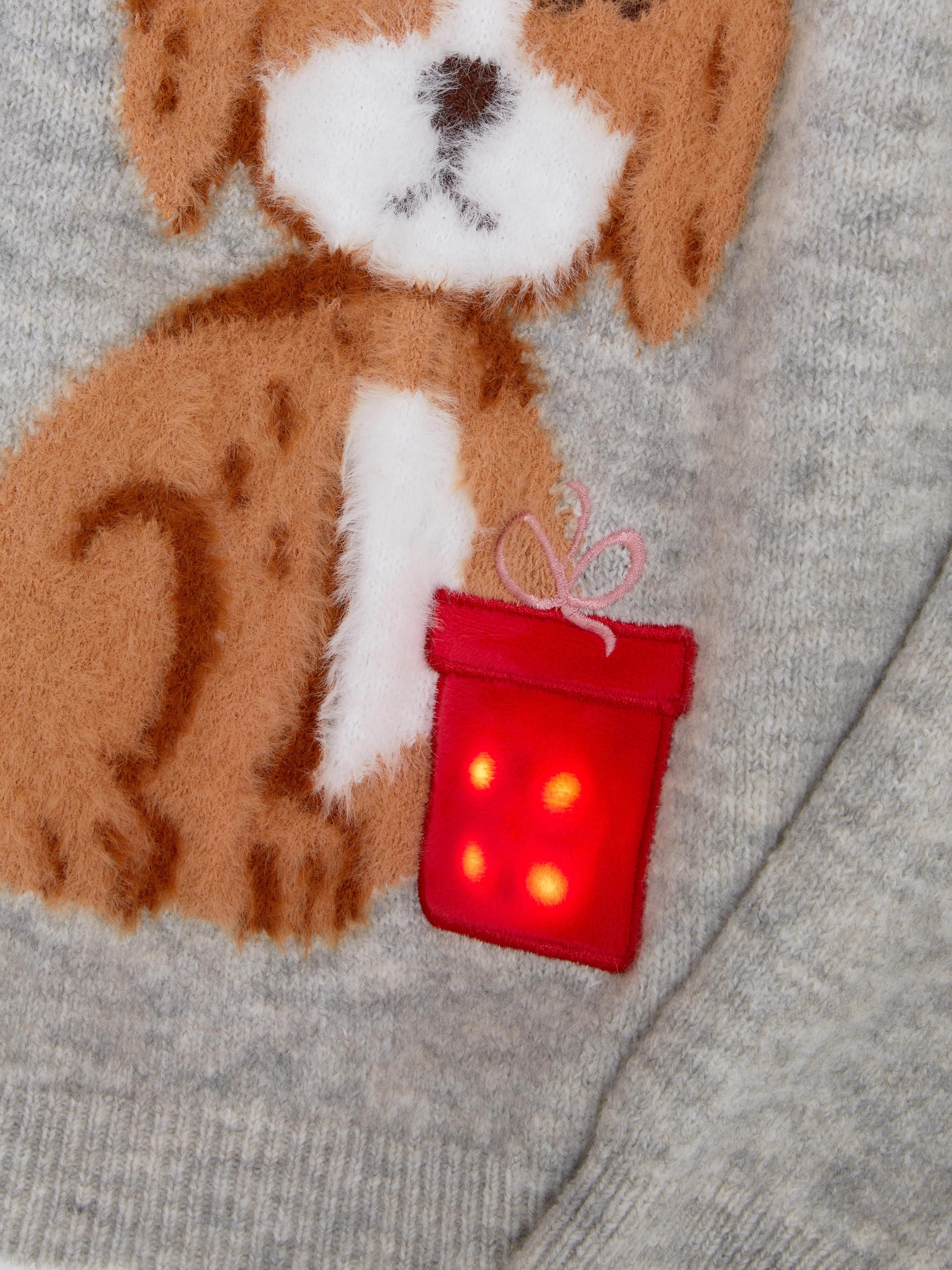 Jersey con luces y diseño navideño de perro