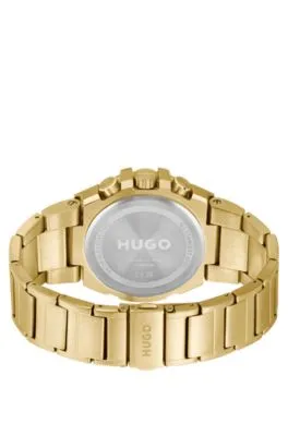 Reloj de esfera negra en acero dorado amarillo