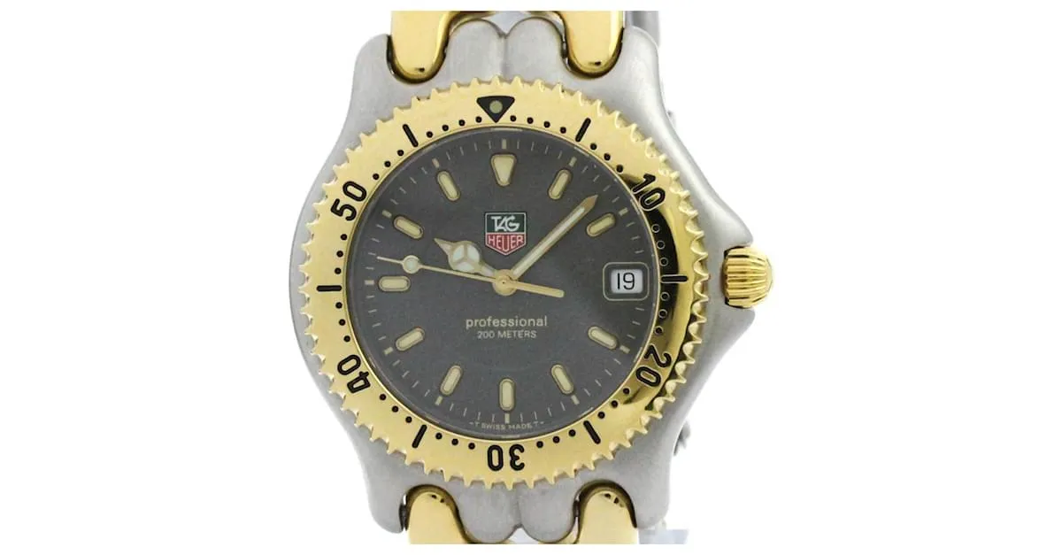 TAG HEUER Sel Profesional 200M Reloj de Acero Baño de Oro WG1120 