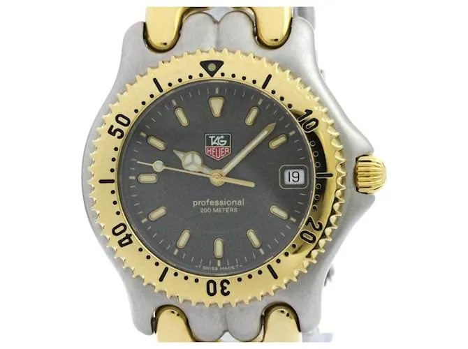 TAG HEUER Sel Profesional 200M Reloj de Acero Baño de Oro WG1120 