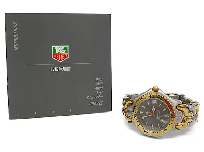 TAG HEUER Sel Profesional 200M Reloj de Acero Baño de Oro WG1120 